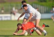 13 July 2013; Dessie Finnegan, Louth, in action against Mikey Conway, left, and John Doyle, Kildare. GAA Football All-Ireland Senior Championship, Round 2, Kildare v Louth, St Conleth's Park, Newbridge, Co. Kildare. Picture credit: Barry Cregg / SPORTSFILE