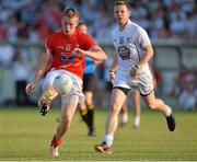 13 July 2013; Ciarann Byrne, Louth, in action against Morgan O'Flaherty, Kildare. GAA Football All-Ireland Senior Championship, Round 2, Kildare v Louth, St Conleth's Park, Newbridge, Co. Kildare. Picture credit: Barry Cregg / SPORTSFILE