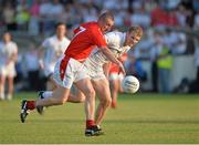 13 July 2013; Ray Finnegan, Louth, in action against Peter Kelly, Kildare. GAA Football All-Ireland Senior Championship, Round 2, Kildare v Louth, St Conleth's Park, Newbridge, Co. Kildare. Picture credit: Barry Cregg / SPORTSFILE
