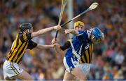 13 July 2013; Waterford goalkeeper Stephen O'Keeffe clears under pressure from Kilkenny players Aidan Fogarty, left, and Colin Fennelly. GAA Hurling All-Ireland Senior Championship, Phase III, Kilkenny v Waterford, Semple Stadium, Thurles, Co. Tipperary. Picture credit: Ray McManus / SPORTSFILE