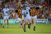 13 July 2013; Tony Browne, Waterford, clears under pressure from Kilkenny players Colin Fennelly and Aidan Fogarty. GAA Hurling All-Ireland Senior Championship, Phase III, Kilkenny v Waterford, Semple Stadium, Thurles, Co. Tipperary. Picture credit: Ray McManus / SPORTSFILE