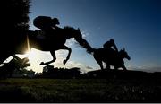 30 April 2021; A general view as runners and riders jump the last, first time round during the SalesSense International Novice Hurdle during day four of the Punchestown Festival at Punchestown Racecourse in Kildare. Photo by Harry Murphy/Sportsfile