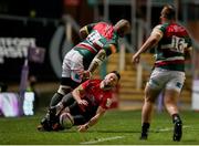 30 April 2021; John Cooney of Ulster is caught by Nemani Nadolo of Leicester Tigers before leaving the pitch for a HIA during the Heineken Challenge Cup semi-final match between Leicester Tigers and Ulster at Welford Road in Leicester, England. Photo by Matt Impey/Sportsfile