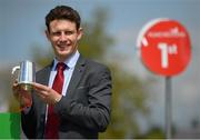 1 May 2021; Champion National Hunt Jockey Paul Townend celebrates with the trophy before racing on day five of the Punchestown Festival at Punchestown Racecourse in Kildare. Photo by Seb Daly/Sportsfile