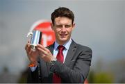 1 May 2021; Champion National Hunt Jockey Paul Townend celebrates with the trophy before racing on day five of the Punchestown Festival at Punchestown Racecourse in Kildare. Photo by Seb Daly/Sportsfile