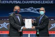 ZADAR, CROATIA - MAY 1: UEFA Delegate Massimo Nanni,  right, presents a plaque to Barça official delegation representative before UEFA Futsal Champions League 2020/21 Semi-Final match between Barça and Kairat Almaty at Krešimir Cosic Arena on May 1, 2021 in Zadar, Croatia. (Photo by Vedran Tolic - UEFA/UEFA via Sportsfile)