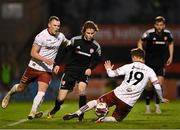 30 April 2021; Will Fitzgerald of Derry City in action against Tyreke Wilson of Bohemians during the SSE Airtricity League Premier Division match between Bohemians and Derry City at Dalymount Park in Dublin. Photo by Seb Daly/Sportsfile