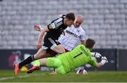 30 April 2021; Georgie Kelly of Bohemians in action against Derry City goalkeeper Nathan Gartside and Cameron McJannet during the SSE Airtricity League Premier Division match between Bohemians and Derry City at Dalymount Park in Dublin. Photo by Seb Daly/Sportsfile