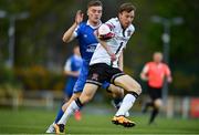30 April 2021; David McMillan of Dundalk in action against Cameron Evans of Waterford  during the SSE Airtricity League Premier Division match between Waterford and Dundalk at RSC in Waterford. Photo by Sam Barnes/Sportsfile