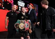1 May 2021; Katie Taylor with her team, from left, trainer Ross Enamait, promoter Eddie Hearn, and manager Brian Peters, after defeating Natasha Jonas in their WBC, WBA, IBF and WBO female lightweight title fight at the Manchester Arena in Manchester, England. Photo by Mark Robinson / Matchroom Boxing via Sportsfile