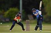 2 May 2021; Rebecca Stokell of Typhoons plays a shot, watched by Scorchers wicketkeeper Shauna Kavanagh, during the Arachas Super 50 Cup 2021 match between Typhoons and Scorchers at Pembroke Cricket Club in Dublin. Photo by Seb Daly/Sportsfile