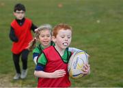 2 May 2021; Oisin Kennedy and Molly Corrigan during Seapoint Minis rugby training at Seapoint RFC in Dublin. Photo by Ramsey Cardy/Sportsfile