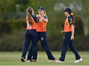 2 May 2021; Leah Paul of Scorchers, left, is congratulated by teammate Gaby Lewis after claiming the wicket of Typhoons' Rachel Delaney  during the Arachas Super 50 Cup 2021 match between Typhoons and Scorchers at Pembroke Cricket Club in Dublin. Photo by Seb Daly/Sportsfile