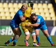 2 May 2021; Andrew Porter, left, and Ed Byrne of Leinster tackle Grégory Alldritt of La Rochelle during the Heineken Champions Cup semi-final match between La Rochelle and Leinster at Stade Marcel Deflandre in La Rochelle, France. Photo by Julien Poupart/Sportsfile