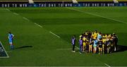 2 May 2021; Ryan Baird of Leinster, left, stands on the pitch as the victorious La Rochelle huddle after the Heineken Champions Cup semi-final match between La Rochelle and Leinster at Stade Marcel Deflandre in La Rochelle, France. Photo by Julien Poupart/Sportsfile