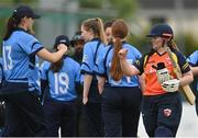 2 May 2021; Jenny Sparrow of Scorchers and Rebecca Stokell of Typhoons after the Arachas Super 50 Cup 2021 match between Typhoons and Scorchers at Pembroke Cricket Club in Dublin. Photo by Seb Daly/Sportsfile