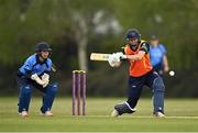 2 May 2021; Gaby Lewis of Scorchers plays a shot watched by Typhoons wicketkeeper Amy Hunter during the Arachas Super 50 Cup 2021 match between Typhoons and Scorchers at Pembroke Cricket Club in Dublin. Photo by Seb Daly/Sportsfile