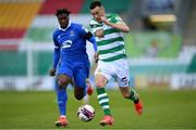 3 May 2021; Aaron Greene of Shamrock Rovers in action against Tunmise Sobowale of Waterford during the SSE Airtricity League Premier Division match between Shamrock Rovers and Waterford at Tallaght Stadium in Dublin. Photo by Seb Daly/Sportsfile