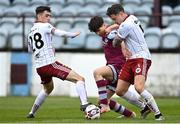 3 May 2021; James Clarke of Drogheda United in action against Rob Cornwall, right, and Dawson Devoy of Bohemians during the SSE Airtricity League Premier Division match between Drogheda United and Bohemians at Head in the Game Park in Drogheda, Louth. Photo by Sam Barnes/Sportsfile