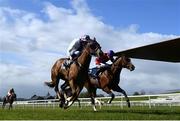 3 May 2021; Lunar Space, with Kevin Manning up, lead Magnanimous, with Gary Halpin up, on their way to winning the Dick McCormick Irish EBF Tetrarch Stakes at The Curragh Racecourse in Kildare. Photo by Harry Murphy/Sportsfile