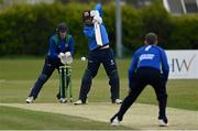 1 May 2021; George Dockrell of Leinster Lightning plays a shot watched by North West Warriors wicketkeeper Stephen Doheny during the Inter-Provincial Cup 2021 match between Leinster Lightning and North West Warriors at Pembroke Cricket Club in Dublin. Photo by Brendan Moran/Sportsfile