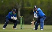 1 May 2021; Jamie Grassi of Leinster Lightning plays a shot watched by North West Warriors wicketkeeper Stephen Doheny during the Inter-Provincial Cup 2021 match between Leinster Lightning and North West Warriors at Pembroke Cricket Club in Dublin. Photo by Brendan Moran/Sportsfile