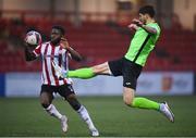 3 May 2021; Kosovar Sadiki of Finn Harps in action against James Akintunde of Derry City during the SSE Airtricity League Premier Division match between Derry City and Finn Harps at Ryan McBride Brandywell Stadium in Derry. Photo by Stephen McCarthy/Sportsfile