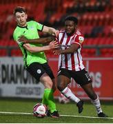 3 May 2021; James Akintunde of Derry City in action against Karl O'Sullivan of Finn Harps during the SSE Airtricity League Premier Division match between Derry City and Finn Harps at Ryan McBride Brandywell Stadium in Derry. Photo by Stephen McCarthy/Sportsfile