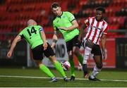 3 May 2021; James Akintunde of Derry City in action against Karl O'Sullivan, centre, and Mark Coyle of Finn Harps during the SSE Airtricity League Premier Division match between Derry City and Finn Harps at Ryan McBride Brandywell Stadium in Derry. Photo by Stephen McCarthy/Sportsfile