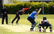 4 May 2021; Ben White of Northern Knights bowls to Jamie Grassi of Leinster Lightning during the Inter-Provincial Cup 2021 match between Leinster Lightning and Northern Knights at Pembroke Cricket Club in Dublin. Photo by Matt Browne/Sportsfile