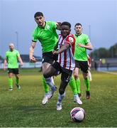 3 May 2021; James Akintunde of Derry City in action against Kosovar Sadiki of Finn Harps during the SSE Airtricity League Premier Division match between Derry City and Finn Harps at the Ryan McBride Brandywell Stadium in Derry. Photo by Stephen McCarthy/Sportsfile