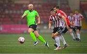 3 May 2021; Mark Coyle of Finn Harps in action against Brendan Barr and Will Patching, right, of Derry City during the SSE Airtricity League Premier Division match between Derry City and Finn Harps at the Ryan McBride Brandywell Stadium in Derry. Photo by Stephen McCarthy/Sportsfile