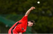 6 May 2021; Curtis Campher of Munster Reds bowls during the Cricket Ireland InterProvincial Cup 2021 match between North West Warriors and Munster Reds at Eglinton Cricket Club in Derry. Photo by Stephen McCarthy/Sportsfile