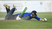 6 May 2021; Shane Getkate of North West Warriors collides with the stumps during the Cricket Ireland InterProvincial Cup 2021 match between North West Warriors and Munster Reds at Eglinton Cricket Club in Derry. Photo by Stephen McCarthy/Sportsfile