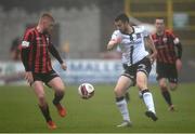 3 May 2021; Michael Duffy of Dundalk in action against Aodh Dervin of Longford Town during the SSE Airtricity League Premier Division match between Longford Town and Dundalk at Bishopsgate in Longford. Photo by Ramsey Cardy/Sportsfile