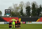 3 May 2021; The Longford Town team huddle prior to the SSE Airtricity League Premier Division match between Longford Town and Dundalk at Bishopsgate in Longford. Photo by Ramsey Cardy/Sportsfile