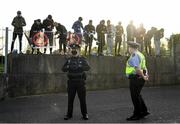 7 May 2021; Members of An Garda Síochána look on as Dundalk supporters gather outside the ground the SSE Airtricity League Premier Division match between Dundalk and Sligo Rovers at Oriel Park in Dundalk, Louth. Photo by Ben McShane/Sportsfile