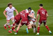 7 May 2021; David McCann of Ulster is tackled by Fineen Wycherley, left, Chris Cloete, centre, and Conor Murray of Munster during the Guinness PRO14 Rainbow Cup match between Munster and Ulster at Thomond Park in Limerick. Photo by Ramsey Cardy/Sportsfile