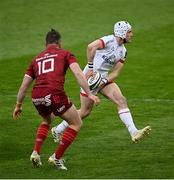 7 May 2021; Michael Lowry of Ulster in action against JJ Hanrahan of Munster during the Guinness PRO14 Rainbow Cup match between Munster and Ulster at Thomond Park in Limerick. Photo by Ramsey Cardy/Sportsfile