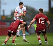 7 May 2021; Jacob Stockdale of Ulster is tackled by Andrew Conway of Munster during the Guinness PRO14 Rainbow Cup match between Munster and Ulster at Thomond Park in Limerick. Photo by Ramsey Cardy/Sportsfile