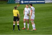 7 May 2021; Referee Craig Evans shows a red card to Will Addison of Ulster, centre, during the Guinness PRO14 Rainbow Cup match between Munster and Ulster at Thomond Park in Limerick. Photo by Ramsey Cardy/Sportsfile
