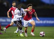 7 May 2021; Jordan Gibson of Sligo Rovers in action against Wilfred Zahibo of Dundalk during the SSE Airtricity League Premier Division match between Dundalk and Sligo Rovers at Oriel Park in Dundalk, Louth. Photo by Ben McShane/Sportsfile