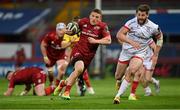 7 May 2021; Andrew Conway of Munster makes a break, chased by Ulster's Stuart McCloskey, during the Guinness PRO14 Rainbow Cup match between Munster and Ulster at Thomond Park in Limerick. Photo by Ramsey Cardy/Sportsfile