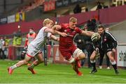 7 May 2021; Gavin Coombes of Munster is tackled by Rob Lyttle of Ulster during the Guinness PRO14 Rainbow Cup match between Munster and Ulster at Thomond Park in Limerick. Photo by Ramsey Cardy/Sportsfile