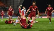 7 May 2021; JJ Hanrahan of Munster celebrates with team-mate Mike Haley after scoring their side's fifth try during the Guinness PRO14 Rainbow Cup match between Munster and Ulster at Thomond Park in Limerick. Photo by Ramsey Cardy/Sportsfile