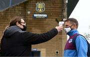 8 May 2021; Dane Massey of Drogheda United has his temperature taken by Waterford Covid-19 safety officer Meesha Dunne before the SSE Airtricity League Premier Division match between Waterford and Drogheda United at RSC in Waterford. Photo by Ben McShane/Sportsfile