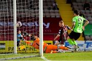 8 May 2021; Ross Tierney of Bohemians scores his side's first goal, past Finn Harps goalkeeper Mark Anthony McGinley, during the SSE Airtricity League Premier Division match between Bohemians and Finn Harps at Dalymount Park in Dublin. Photo by Seb Daly/Sportsfile