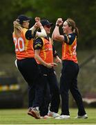 9 May 2021; Scorchers players, from left, Gaby Lewis, Ashlee King and Sophie MacMahon celebrate taking the wicket of Rachel Delaney of Typhoons during the third match of the Arachas Super 50 Cup between Scorchers and Typhoons at Rush Cricket Club in Rush, Dublin. Photo by Harry Murphy/Sportsfile