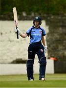 9 May 2021; Orla Prendergast of Typhoons raises her bat as she reaches 100 during the third match of the Arachas Super 50 Cup between Scorchers and Typhoons at Rush Cricket Club in Rush, Dublin. Photo by Harry Murphy/Sportsfile