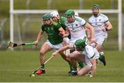 9 May 2021; Ben Conneely, right, supported by Offaly team-mate Brian Watkins, centre, in action against Padraic O'Hanrahan of Meath during the Allianz Hurling League Division 2A Round 1 match between Meath and Offaly at Páirc Táilteann in Navan, Meath. Photo by Ben McShane/Sportsfile